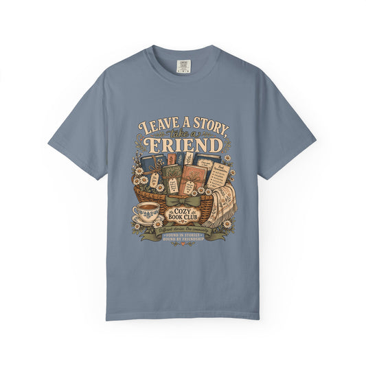Leave a Story, Take a Friend book club T-shirt with gift basket of books and flowers on Blue Jean.