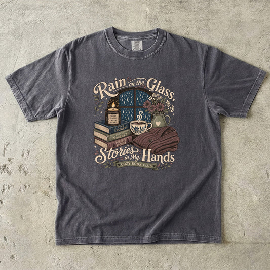 Rain on the Glass rainy day reading T-shirt with books, tea and candle design on Pepper.