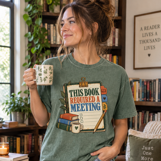 Book club T-shirt featuring “This Book Required a Meeting” on an illustrated reading agenda