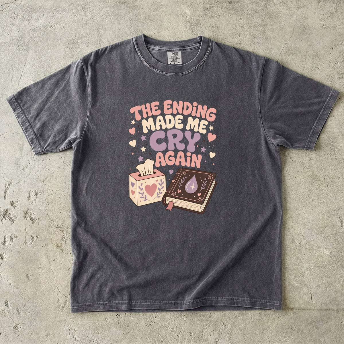Alt Text: The Ending Made Me Cry Again funny reading shirt in Pepper with retro book, tissue box, hearts and teardrop design.