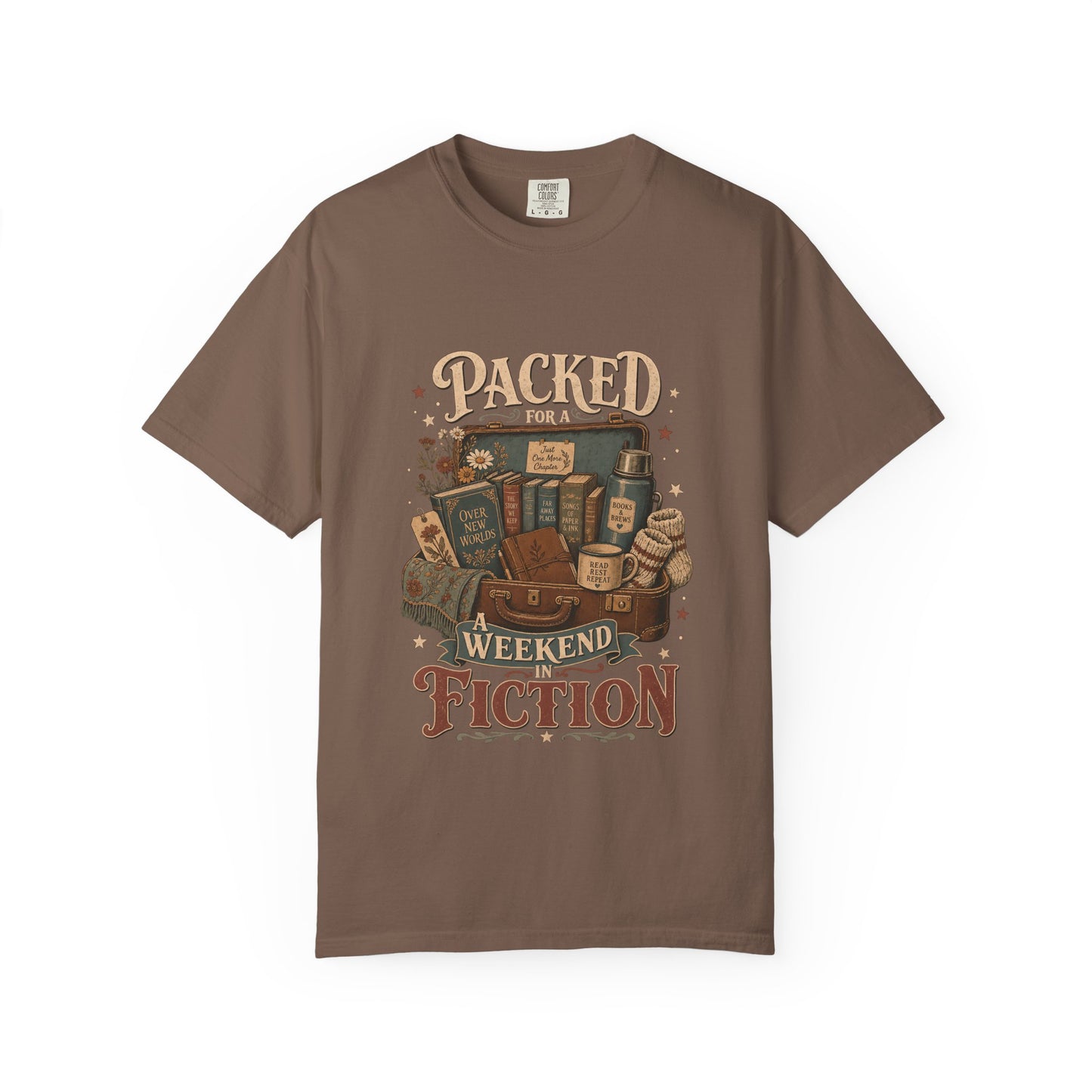 Packed for a Weekend in Fiction reading T-shirt in Espresso featuring a vintage suitcase packed with books, a mug, thermos and cozy socks