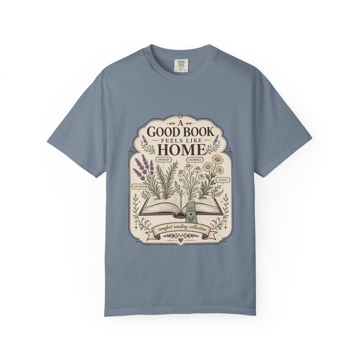 A Good Book Feels Like Home book lover T-shirt with open book, lavender, rosemary, chamomile and daisy botanical design on Blue Jean.
