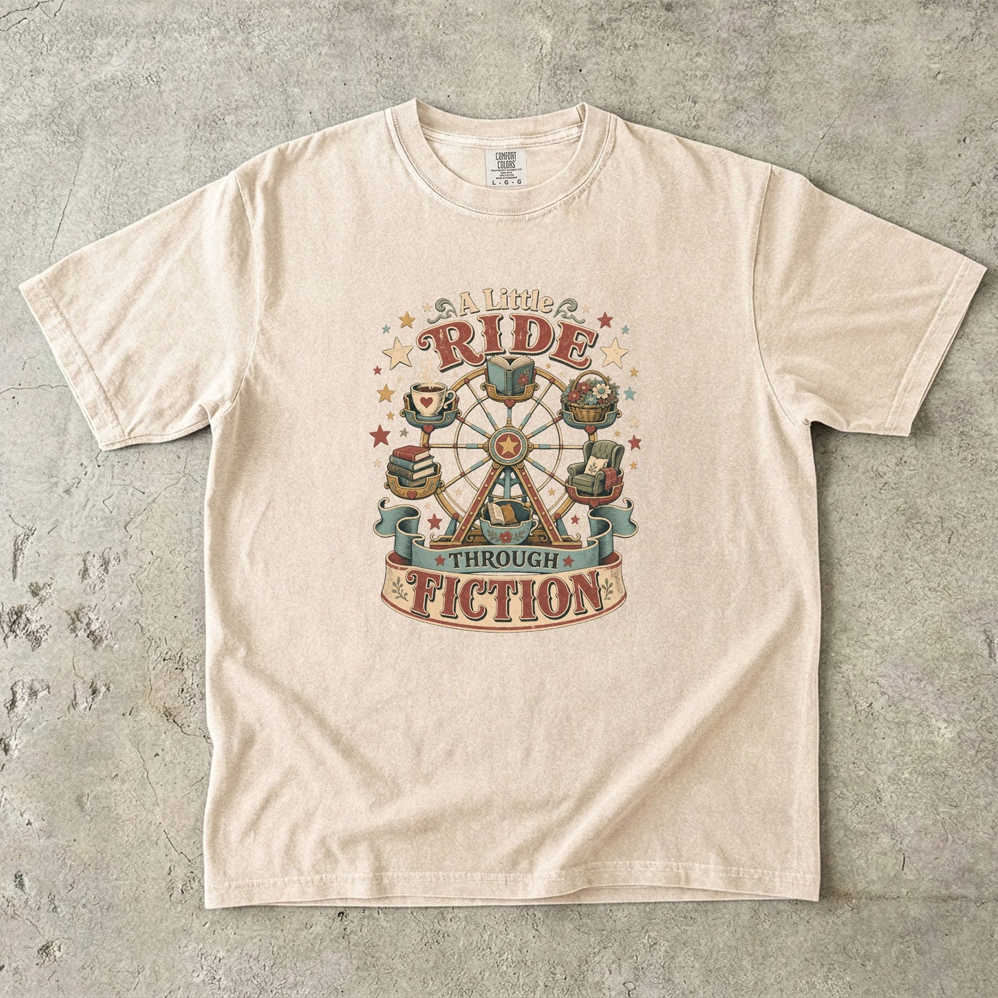 Front view of an Ivory Comfort Colors book lover shirt featuring the "A Little Ride Through Fiction" vintage literary illustration with books, flowers and cozy reading details.