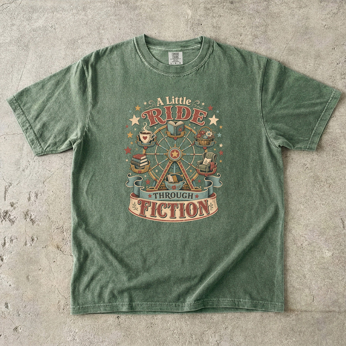 A Little Ride Through Fiction book lover T-shirt in Moss featuring a vintage Ferris wheel with books, tea, flowers and reading chair