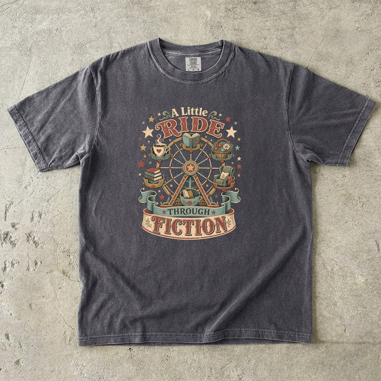 Front view of a Pepper Comfort Colors graphic T-shirt featuring the vintage "A Little Ride Through Fiction" book lover artwork celebrating the joy of reading.