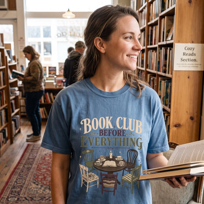 Book Club Before Everything T-shirt featuring a vintage book club table with an open book, teacups, candle and mismatched chairs.