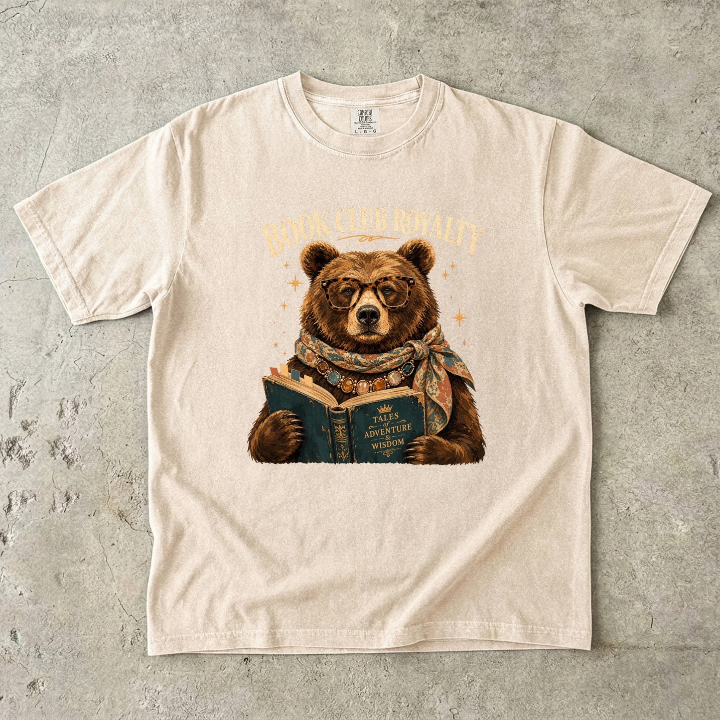 Ivory Comfort Colors book club T-shirt featuring a bespectacled bear reading a vintage book.