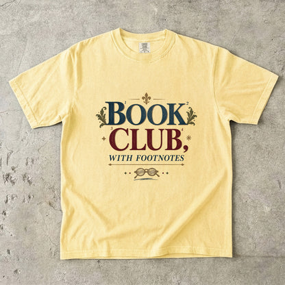 Butter book club T-shirt with “Book Club, With Footnotes,” numbered markers and reading glasses