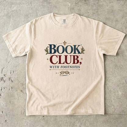 Ivory book club T-shirt with “Book Club, With Footnotes,” numbered markers and reading glasses