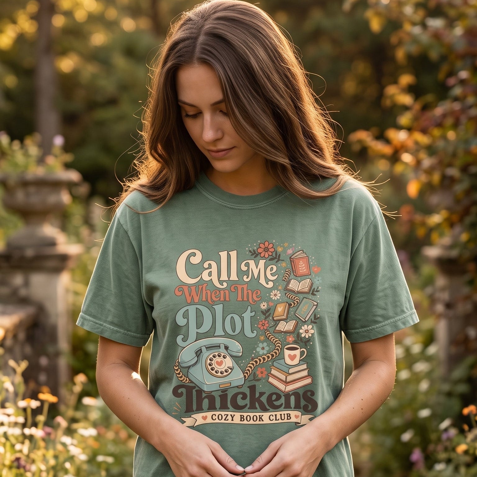Call Me When the Plot Thickens book club T-shirt featuring a vintage rotary telephone with books, flowers and a cozy reading theme