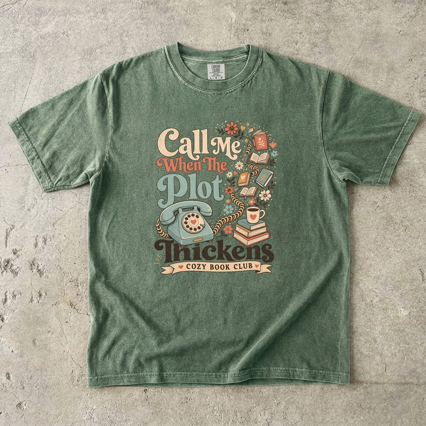 Call Me When the Plot Thickens book club T-shirt in Moss featuring a vintage rotary phone, books and flowers