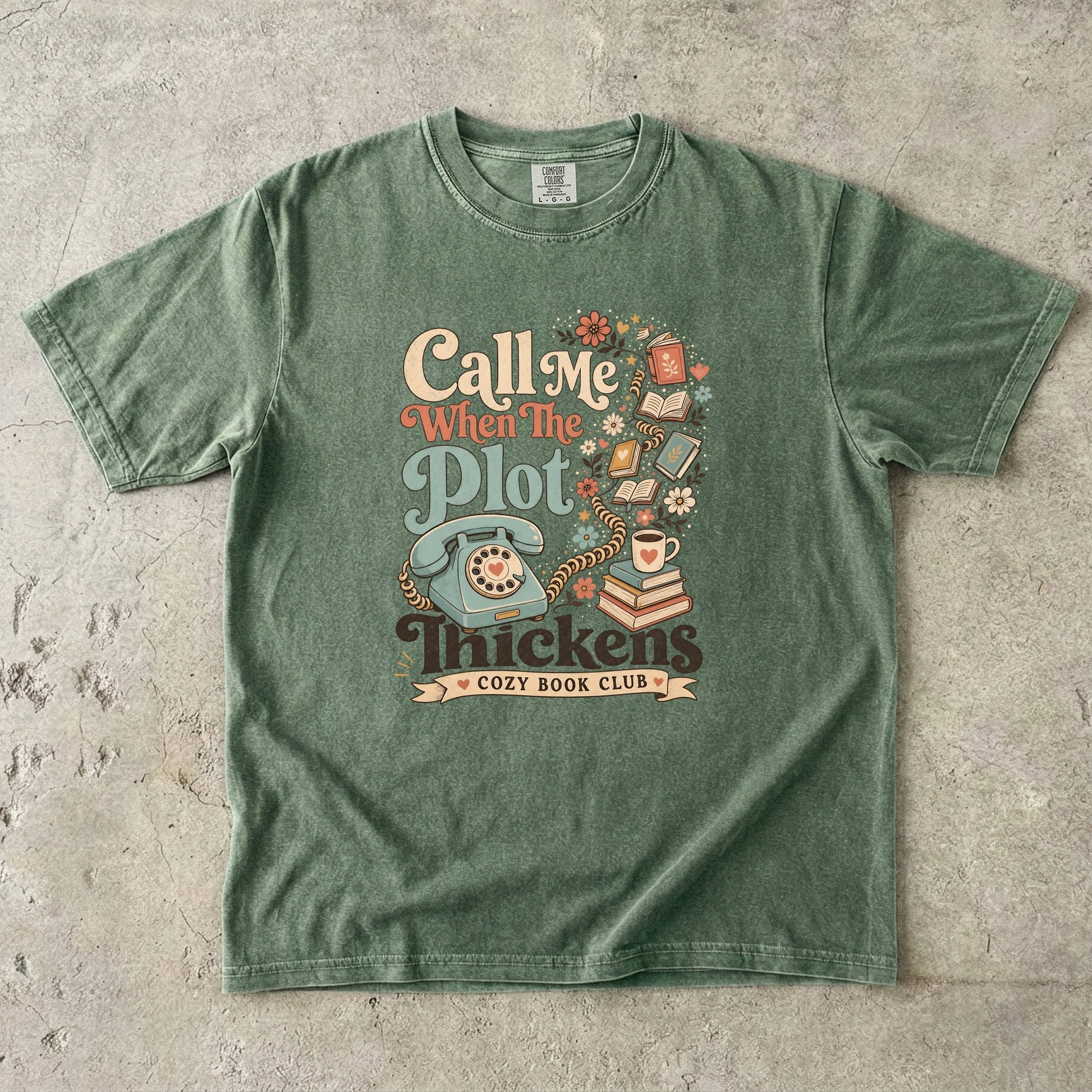 Call Me When the Plot Thickens book club T-shirt in Moss featuring a vintage rotary phone, books and flowers
