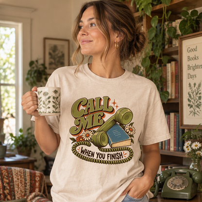 Book lover T-shirt featuring “Call Me When You Finish” with a retro telephone, book and flowers