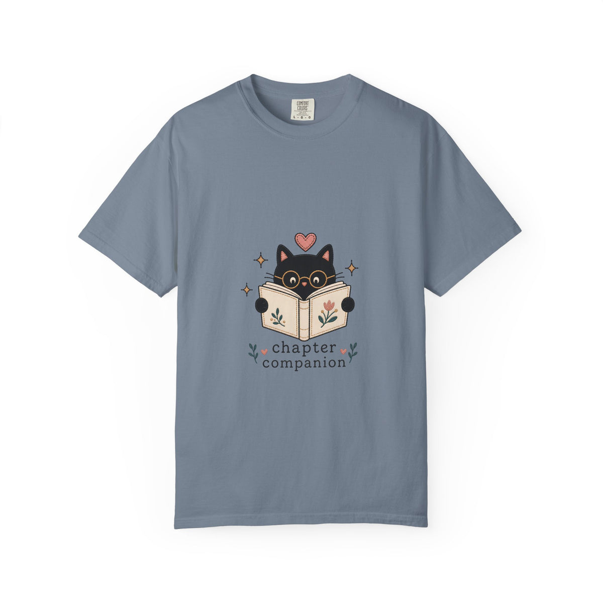 Chapter Companion cat reading shirt in Blue Jean featuring a black cat with glasses reading a floral book.