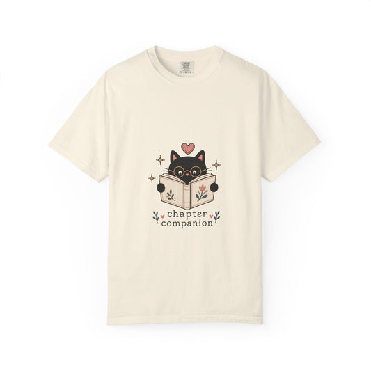 Chapter Companion cat reading shirt in Ivory featuring a black cat with glasses reading a floral book.