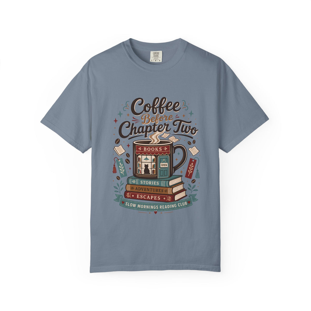 Coffee Before Chapter Two book lover T-shirt in Blue Jean, featuring a coffee mug bookshop, stacked books, bookmarks and literary details.
