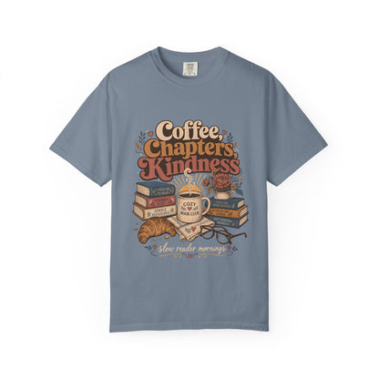 Coffee, Chapters, Kindness cozy reader T-shirt with coffee, books and croissant design on Blue Jean.