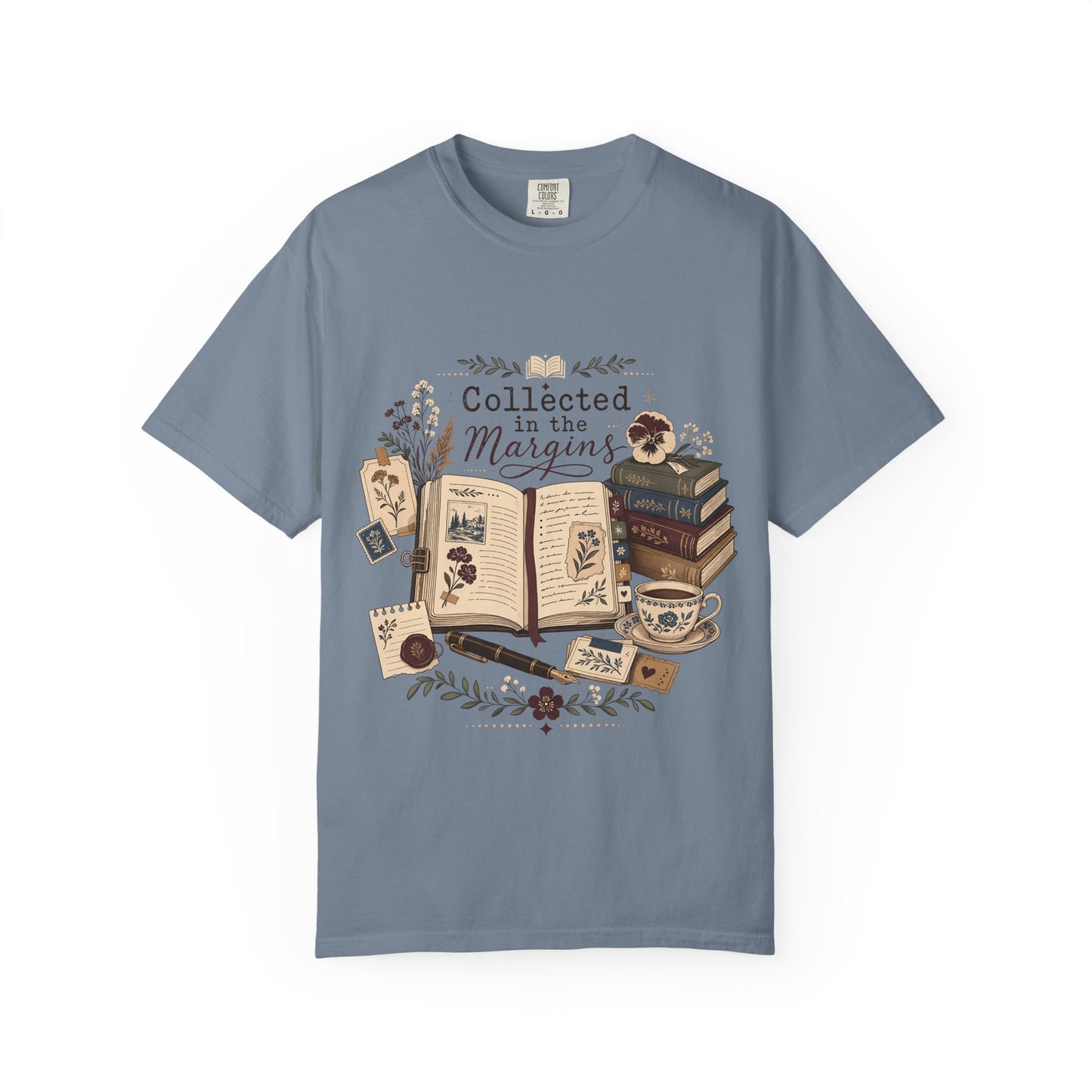 Collected in the Margins literary T-shirt with annotated open book, pressed flowers and notes on Blue Jean.