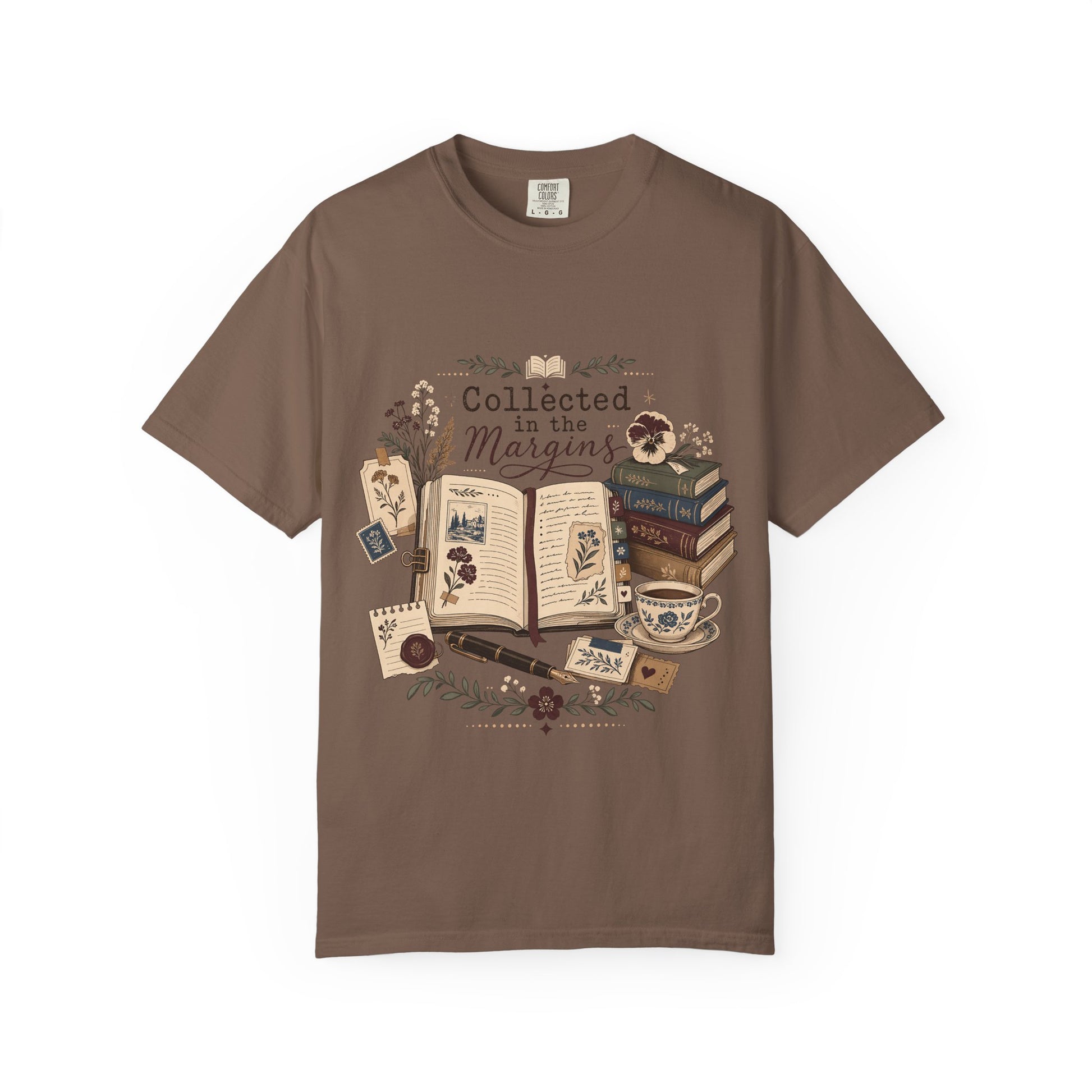 Collected in the Margins literary T-shirt with annotated open book, pressed flowers and notes on Espresso.