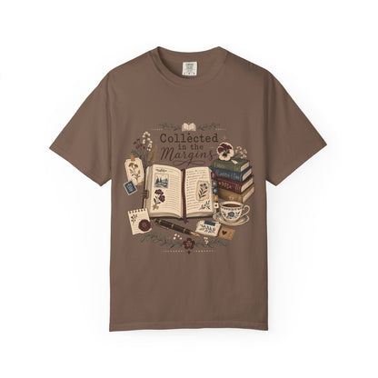 Collected in the Margins literary T-shirt with annotated open book, pressed flowers and notes on Espresso.