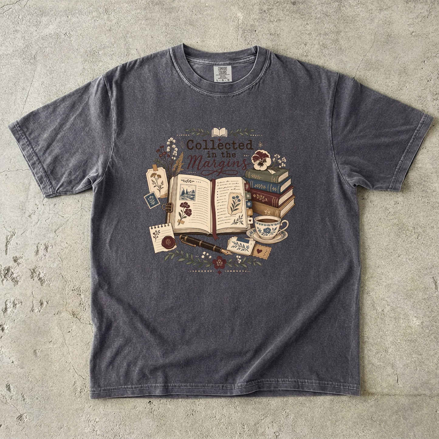 Collected in the Margins literary T-shirt with annotated open book, pressed flowers and notes on Pepper.