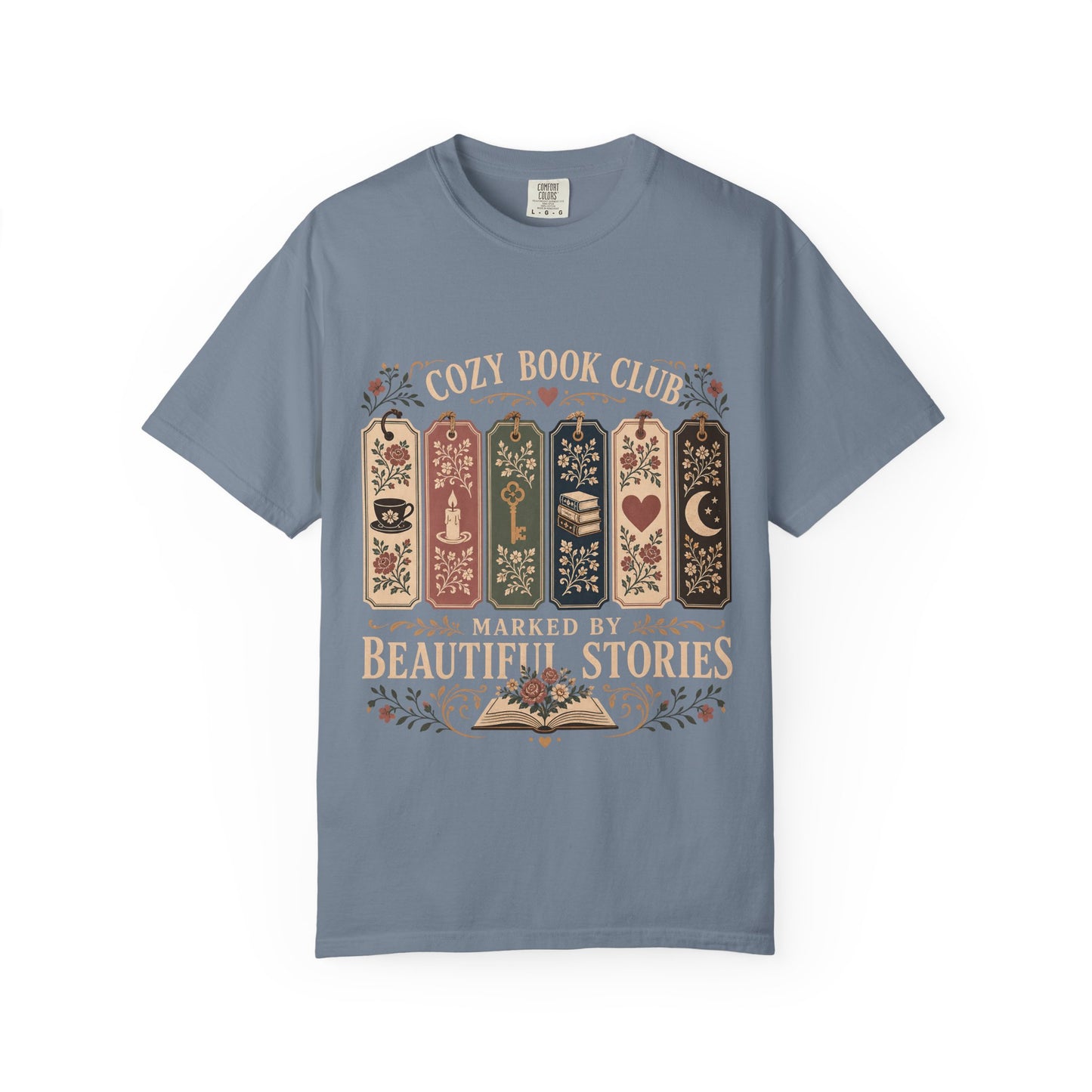 Cozy Book Club – Marked by Beautiful Stories Book Club Shirt on a Blue Jean Comfort Colors T-shirt.

