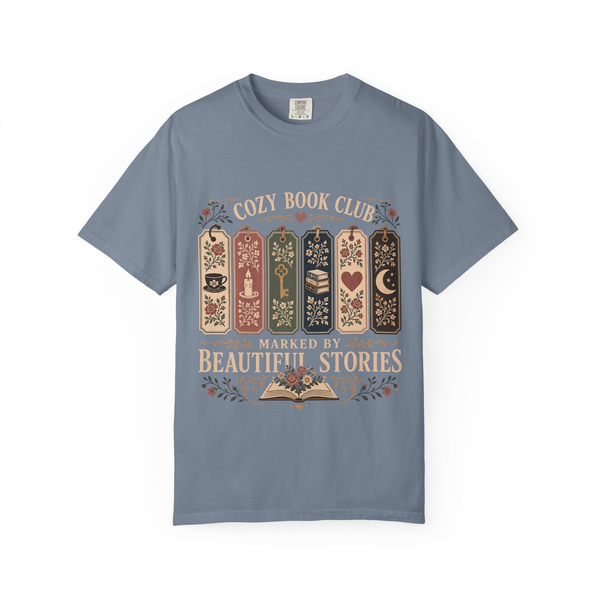 Cozy Book Club – Marked by Beautiful Stories Book Club Shirt on a Blue Jean Comfort Colors T-shirt.

