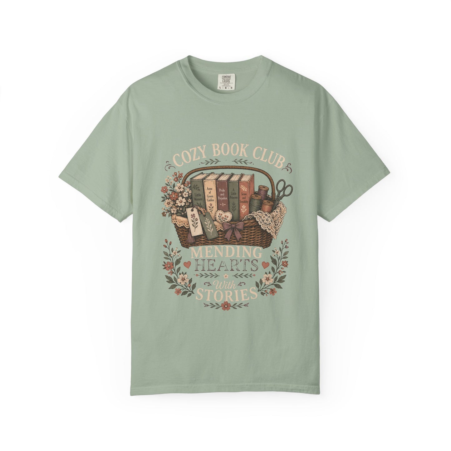 Cozy Book Club – Mending Hearts With Stories design on a Seafoam Comfort Colors 1717 garment-dyed T-shirt featuring classic books, flowers and botanical details.

