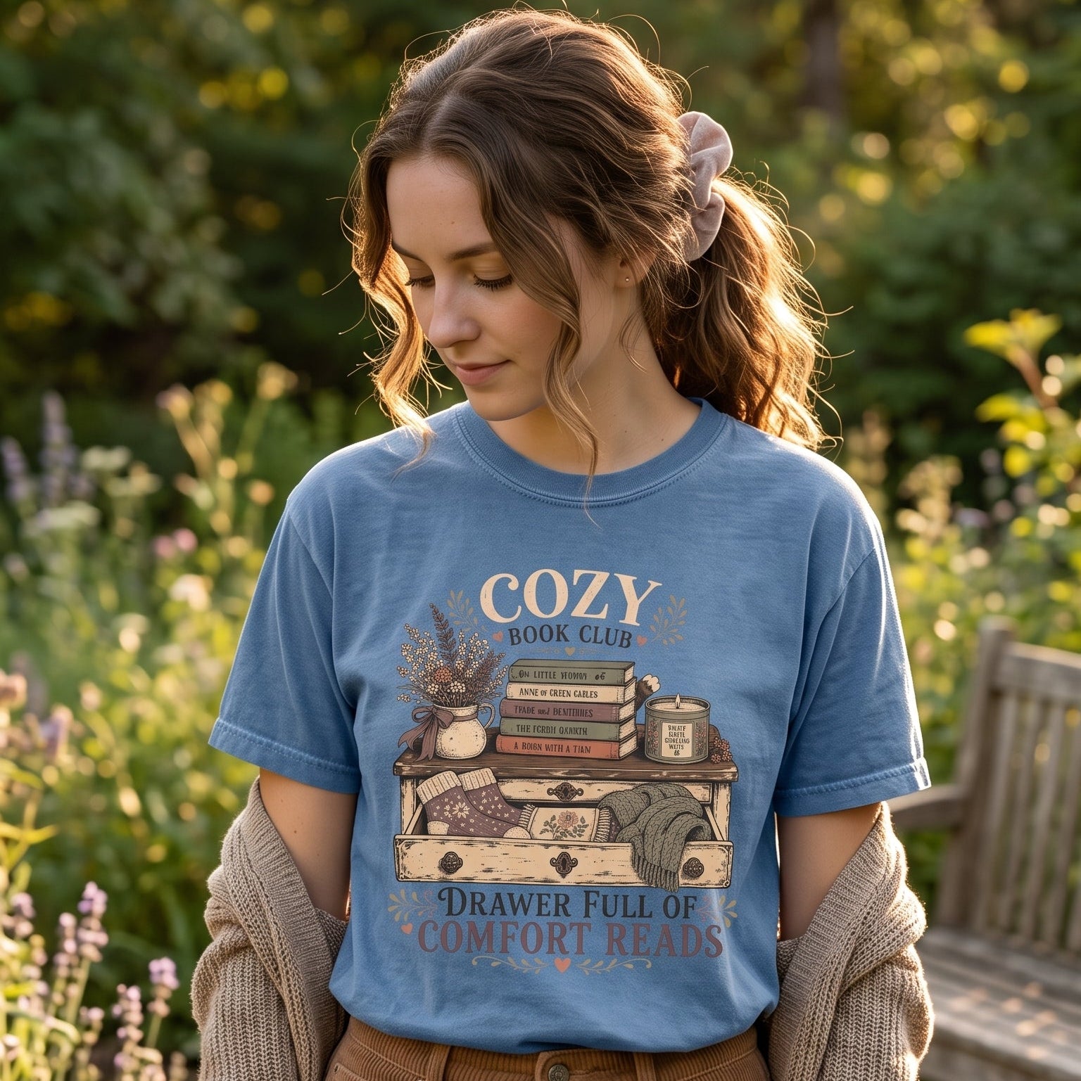Drawer Full of Comfort Reads cozy reading T-shirt featuring a vintage drawer filled with books, blankets, knitted socks and reading comforts