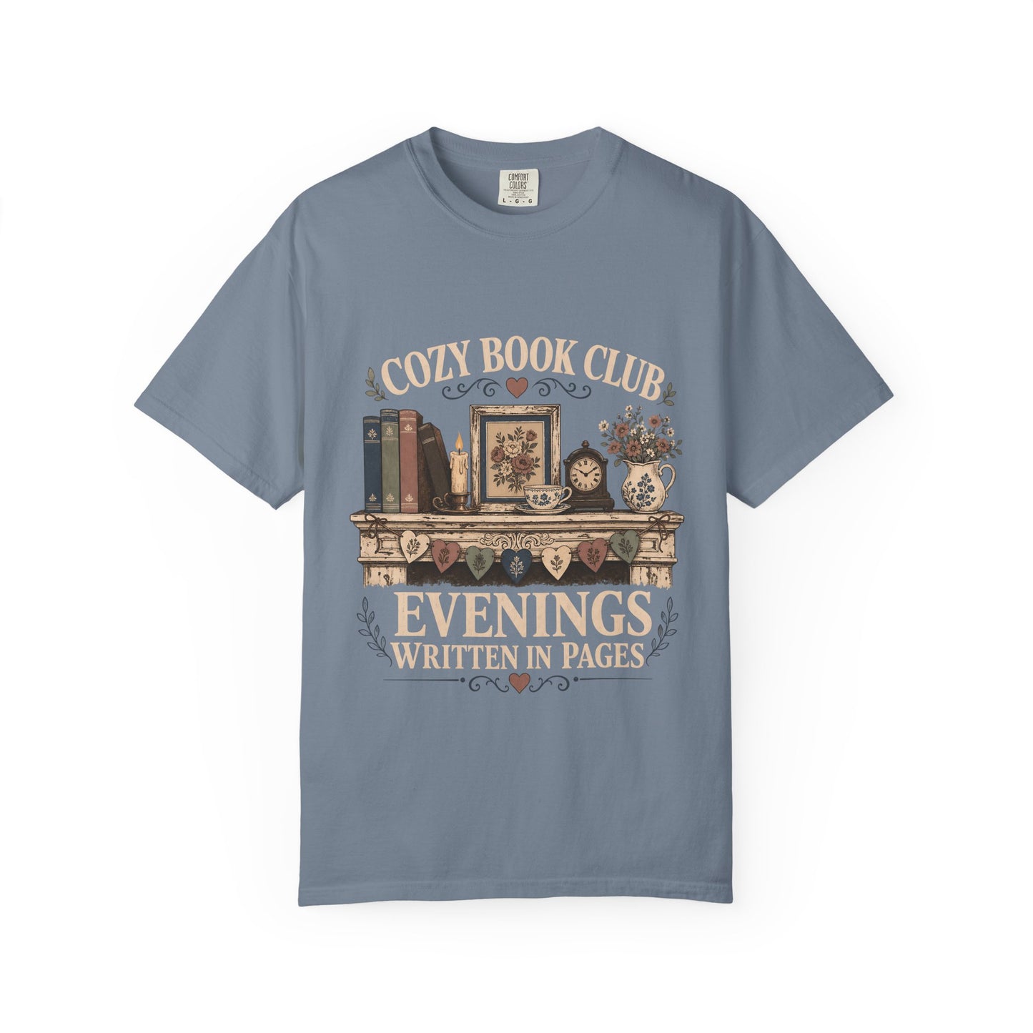 Evenings Written in Pages cozy book club T-shirt in Blue Jean featuring books, a candle, floral teacup, flowers and vintage mantel