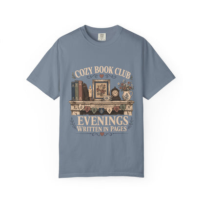 Evenings Written in Pages cozy book club T-shirt in Blue Jean featuring books, a candle, floral teacup, flowers and vintage mantel