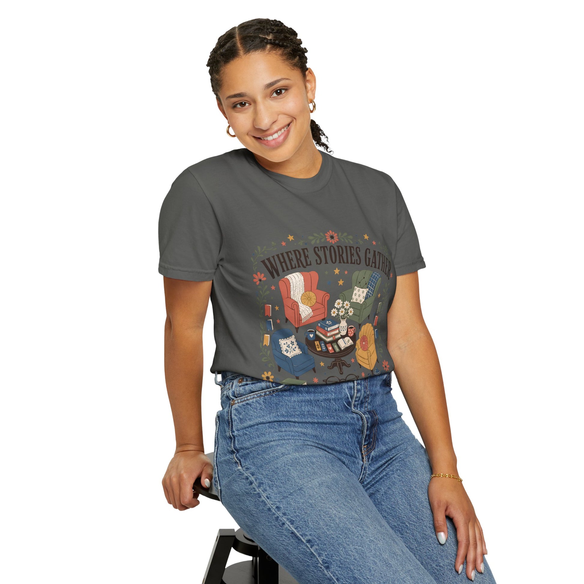 Woman wearing the pepper Where Stories Gather T-shirt inspired by cosy bookshops, quiet afternoons and favourite stories.