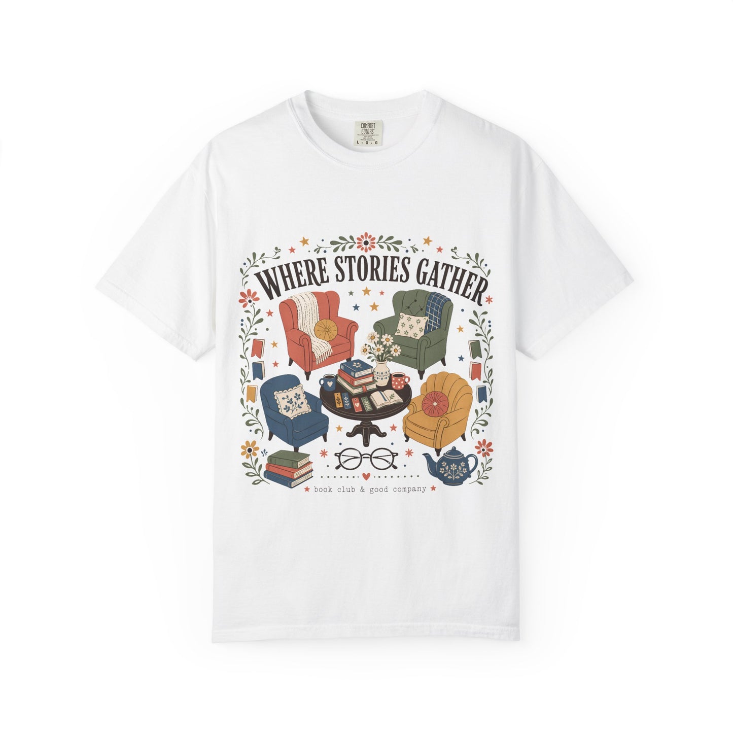 Front view of the white Comfort Colors® Where Stories Gather graphic T-shirt by Flourish Creation Labs.