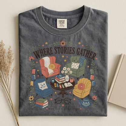 Folded pepper vintage reading T-shirt featuring the Where Stories Gather literary artwork by Flourish Creation Labs.