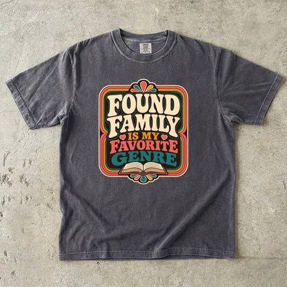 Pepper Comfort Colors book lover T-shirt featuring the retro Found Family Is My Favorite Genre design with an open book.