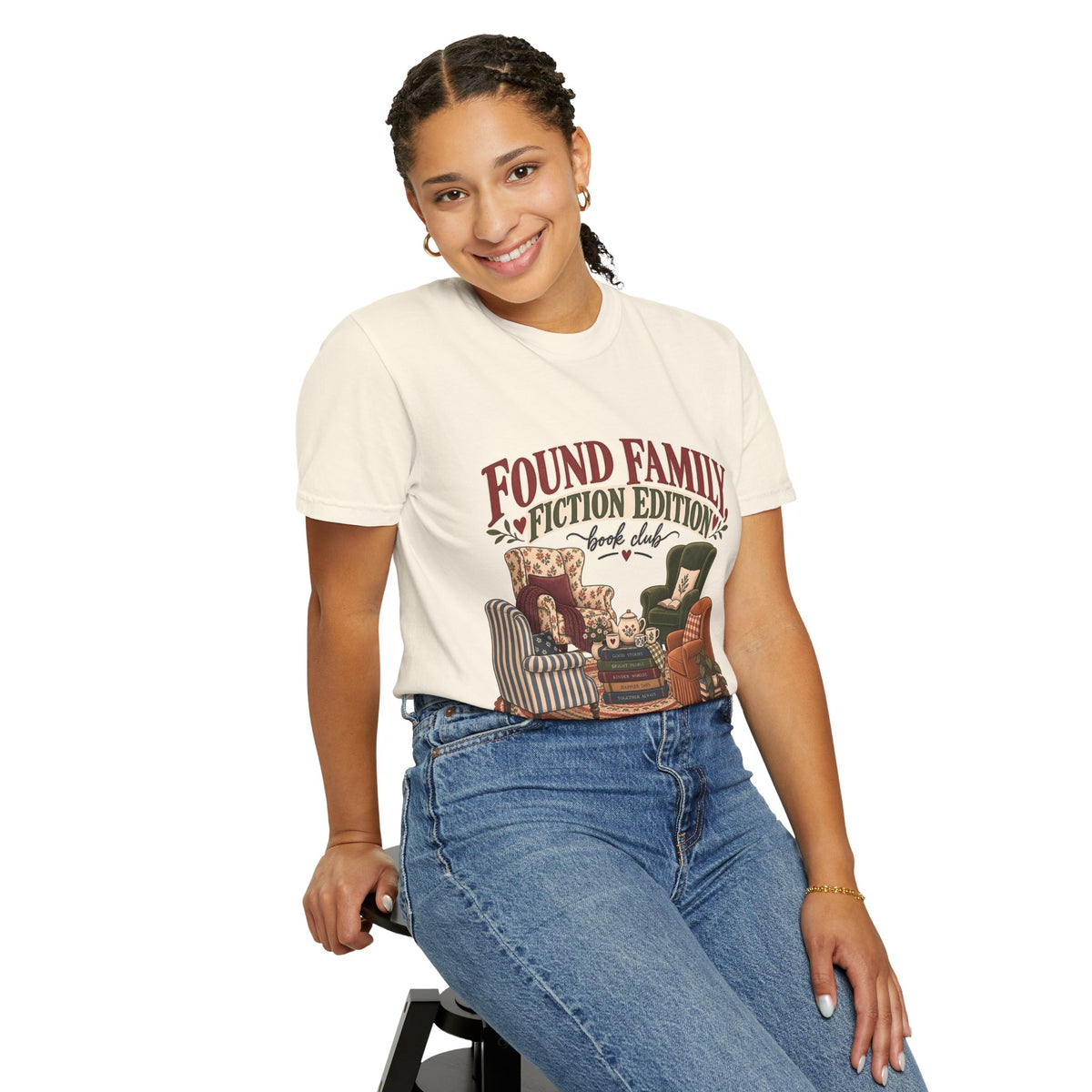 T-shirt featuring “Found Family, Fiction Edition” in a lifestyle presentation.