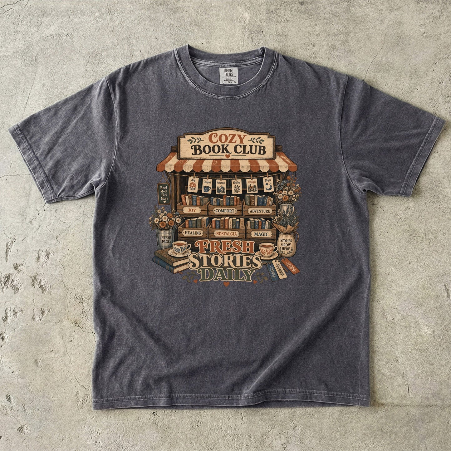 Fresh Stories Daily book club T-shirt in Pepper featuring a vintage bookstall filled with books, flowers and reading themes
