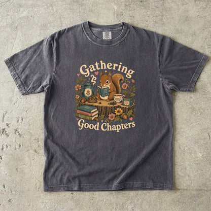 Gathering Good Chapters squirrel reading T-shirt in Pepper featuring a squirrel with a book, teapot, teacup, acorns and flowers