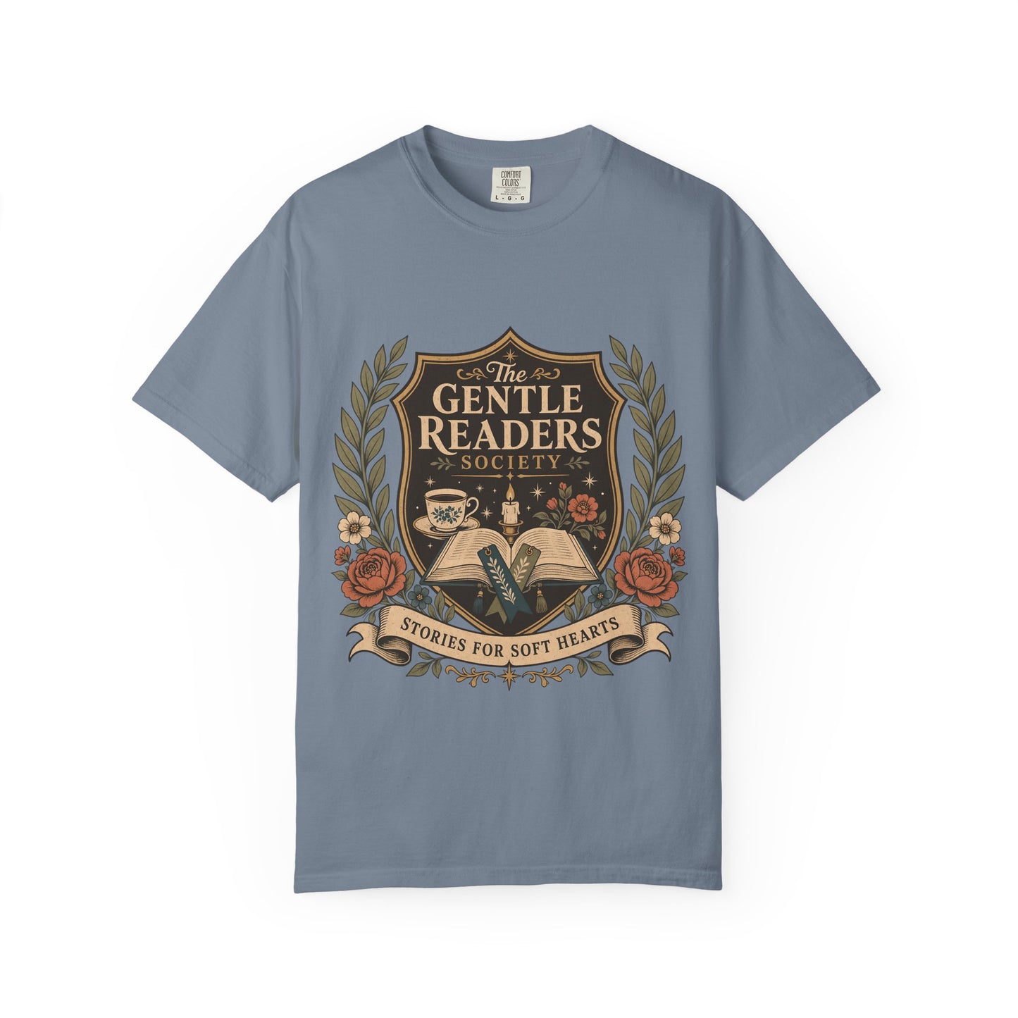 The Gentle Readers Society book club T-shirt with open book, tea and floral crest on Blue Jean.