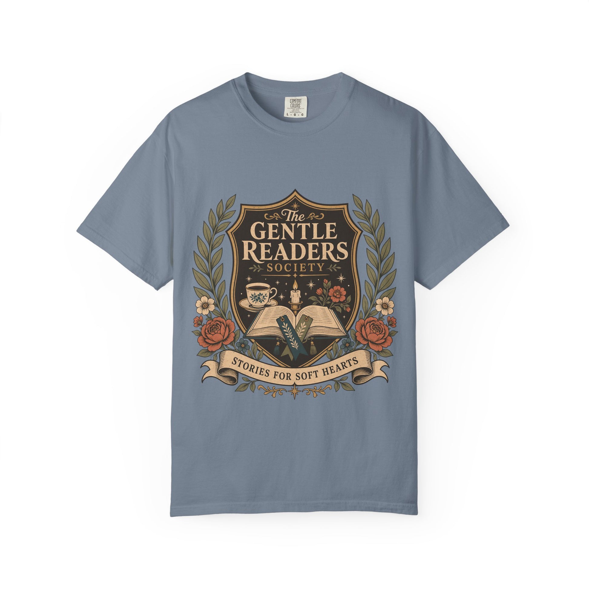 The Gentle Readers Society book club T-shirt with open book, tea and floral crest on Blue Jean.