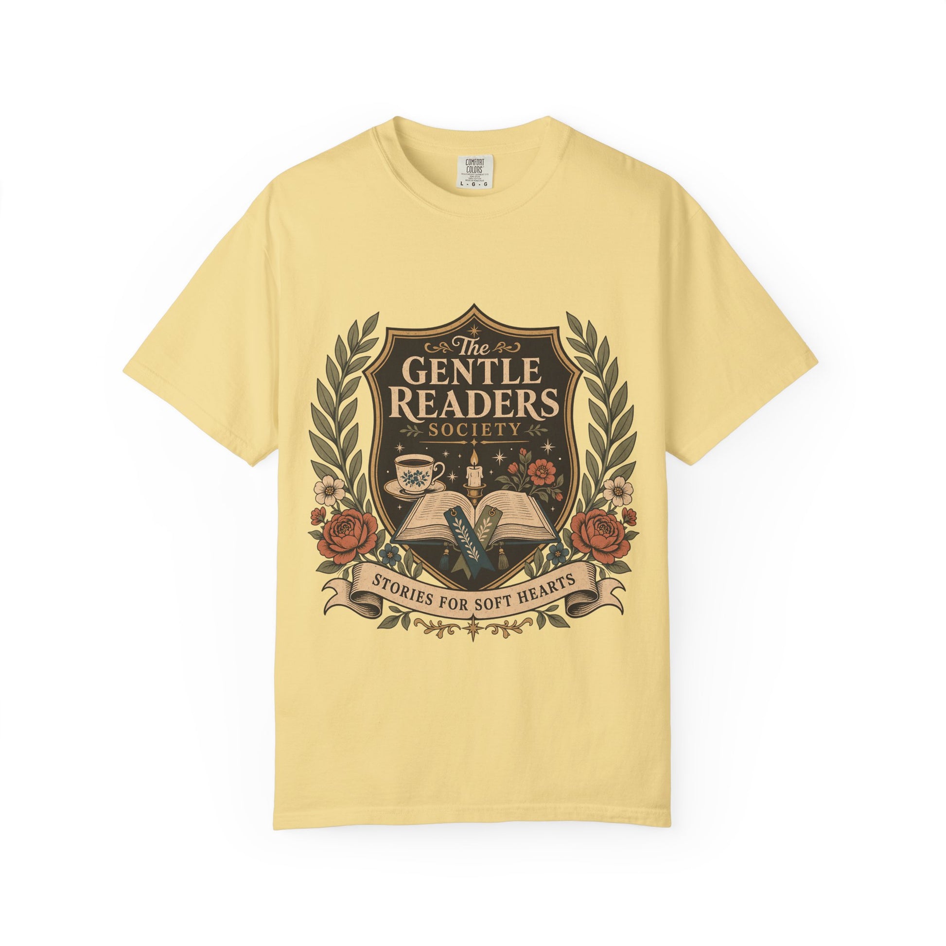 The Gentle Readers Society book club T-shirt with open book, tea and floral crest on Butter.