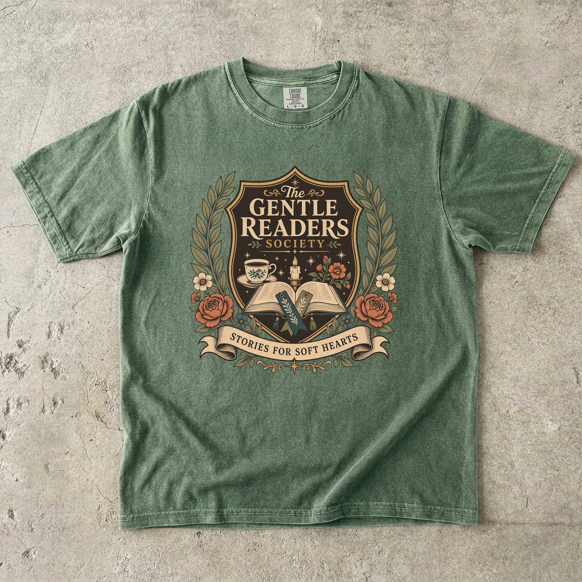 The Gentle Readers Society book club T-shirt with open book, tea and floral crest on Moss.