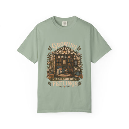 Growing a Library of Feelings Book Lover Shirt on a Bay Comfort Colors T-shirt.

