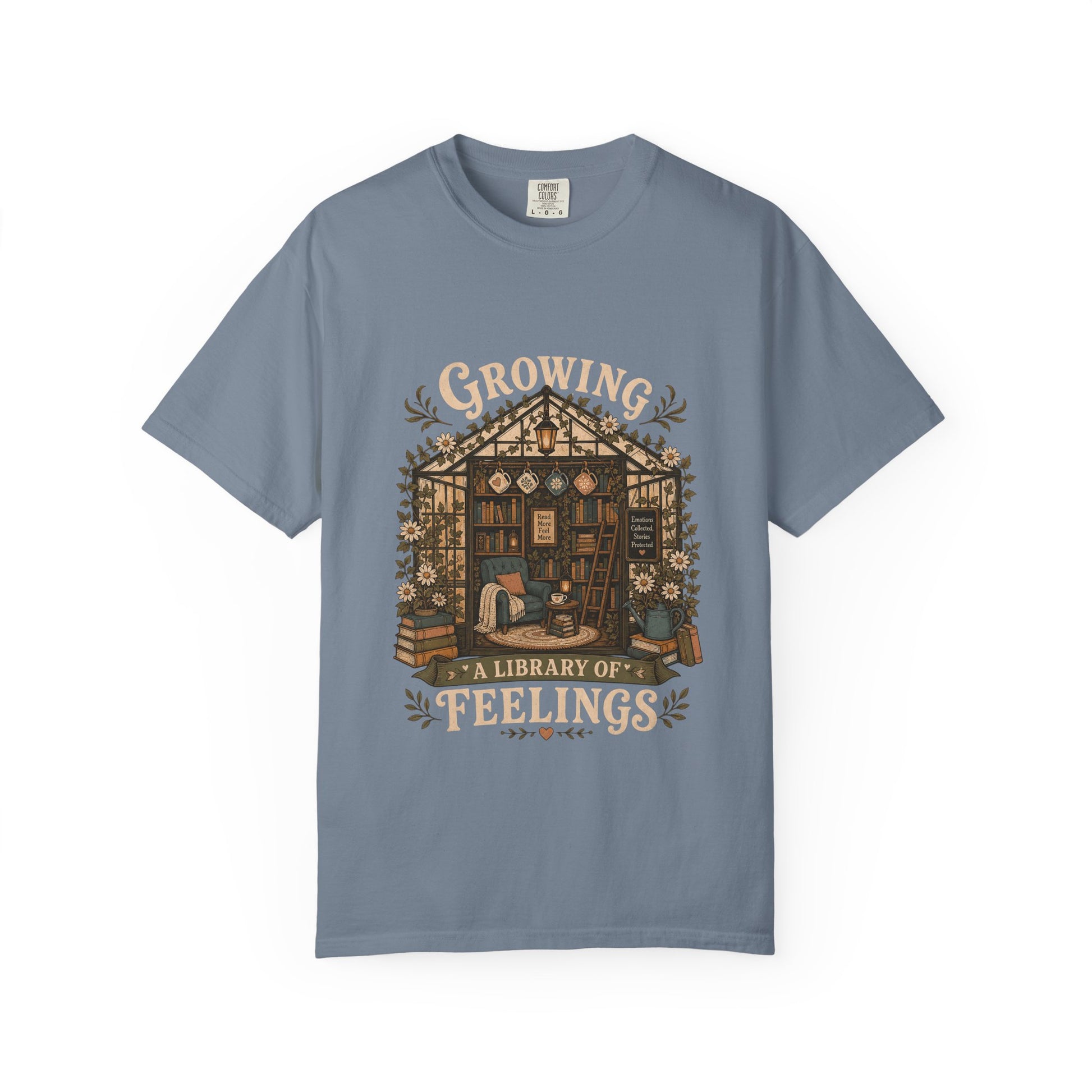 Growing a Library of Feelings Book Lover Shirt on a Blue Jean Comfort Colors T-shirt.

