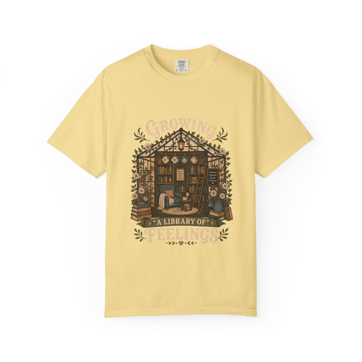Growing a Library of Feelings book lover T-shirt in Butter featuring a botanical greenhouse library with books and a reading chair