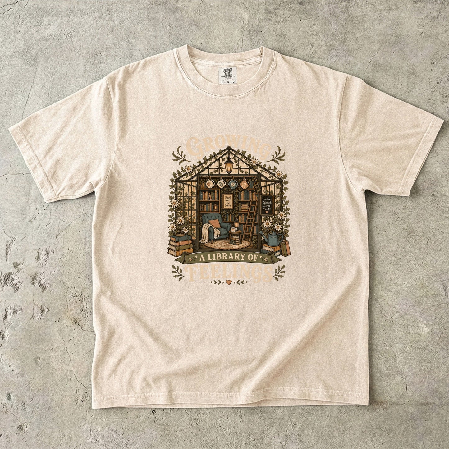 Growing a Library of Feelings Book Lover Shirt on an Ivory Comfort Colors T-shirt featuring a vintage greenhouse library design.

