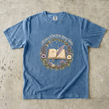 Blue Jean historical fiction T-shirt featuring Historical Fiction Heart, Modern Woman with an open book, lavender quill, moon and wildflowers.