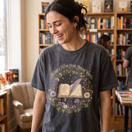 Historical Fiction Heart, Modern Woman T-shirt with an ornate open book, lavender quill, moon and botanical wreath design.