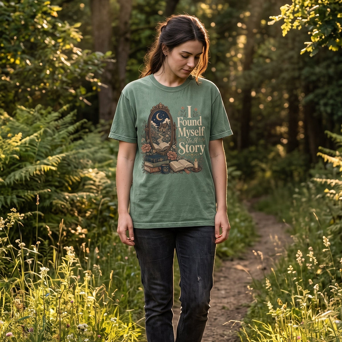 I Found Myself in a Story book lover T-shirt featuring a moonlit storybook cottage, ornate mirror, books and flowers