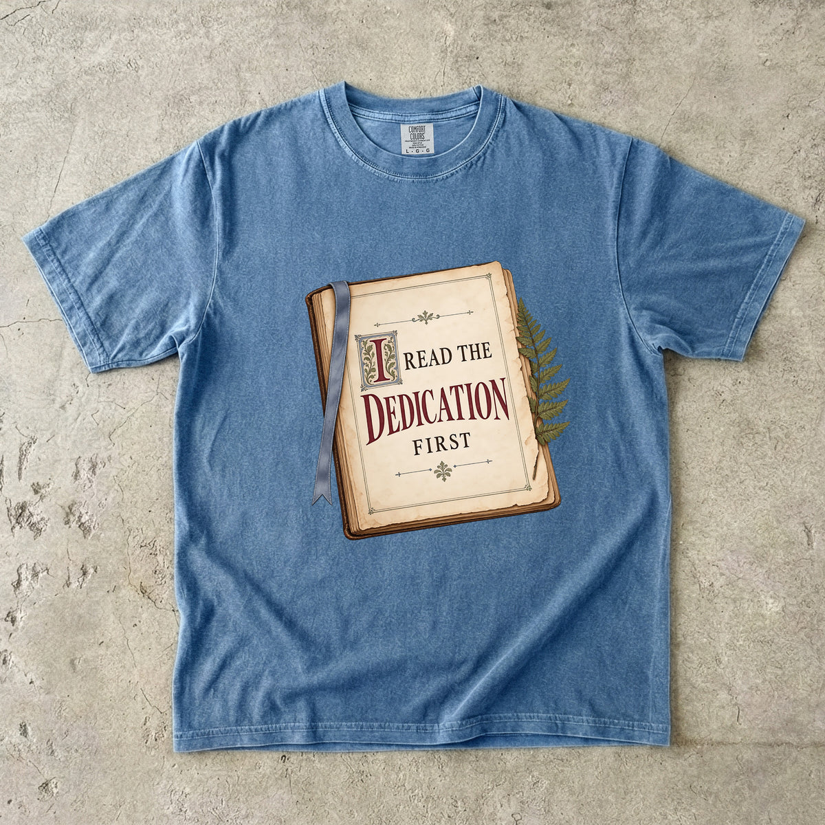 Blue Jean reader T-shirt with “I Read the Dedication First” inside an illustrated old book
